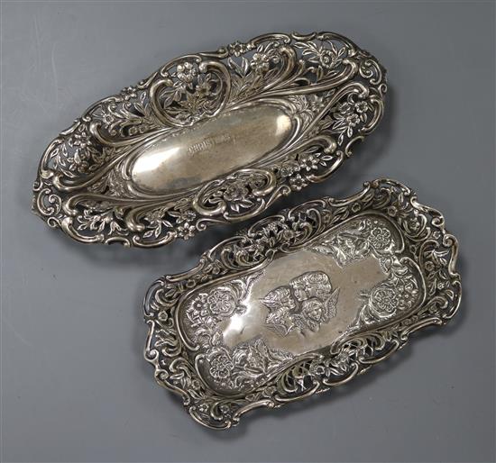 Two late 19th/early 20th century embossed silver trinket dishes, one decorated with Reynolds Angels, 4.5 oz.